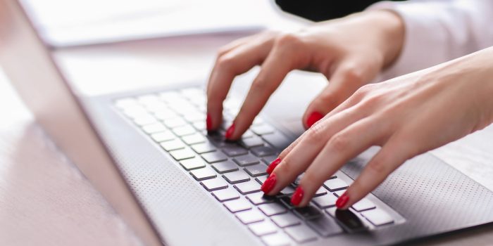 Woman at work with laptop